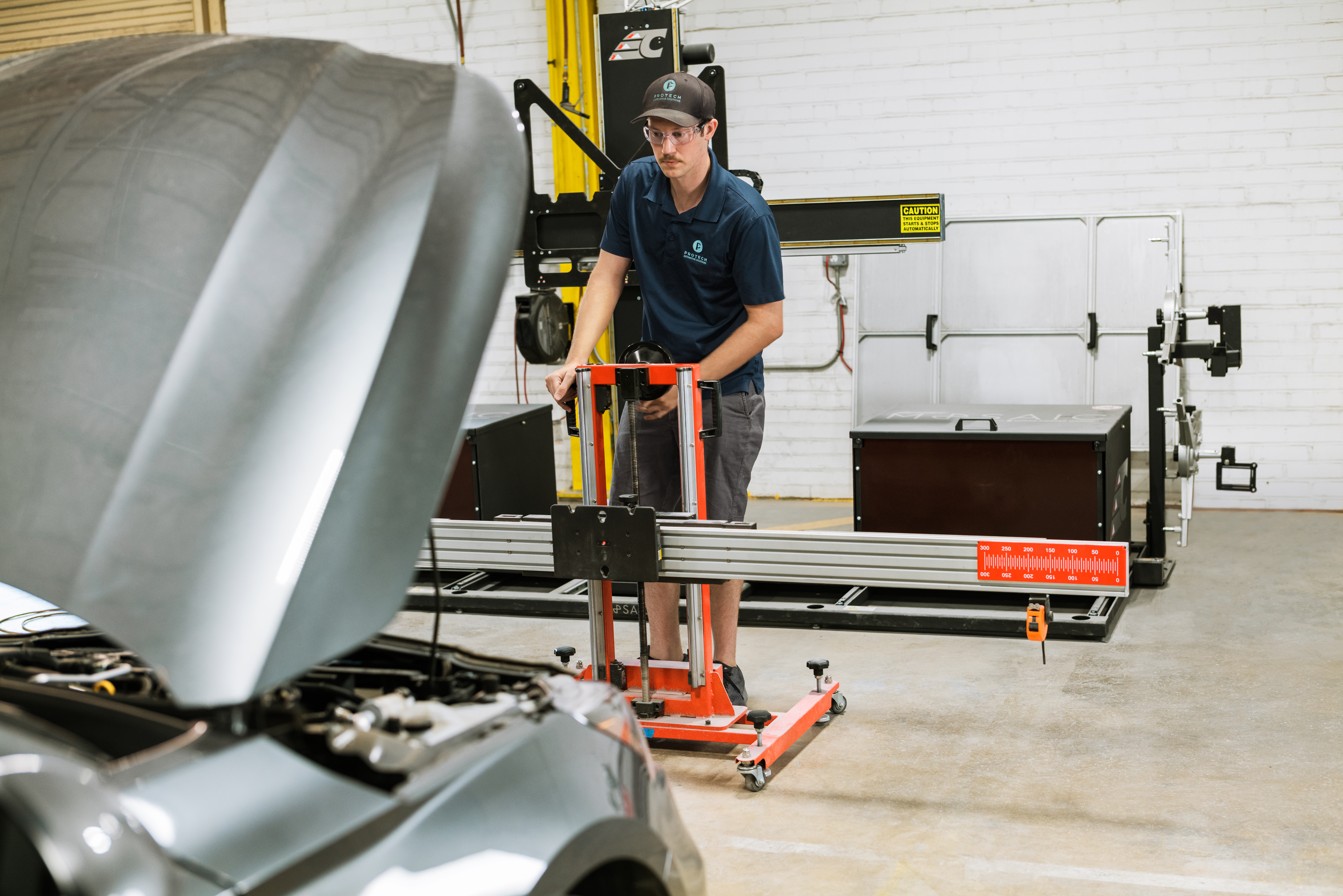 Protech Calibration Tech re-calibrating a vehicle's ADAS.